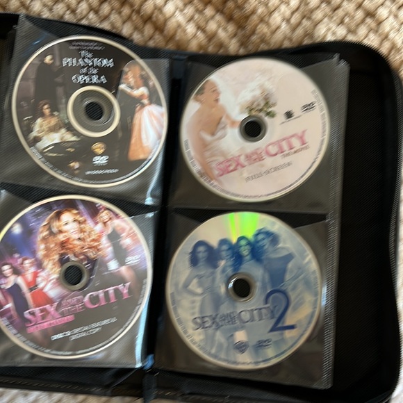 Other - 56 DVD’s in Black Zipper Case Logic-Disney, Comedy, Sex in City, etc